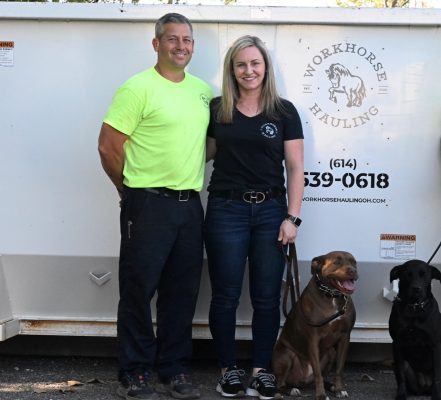 Workhorse Hauling OH | Owners of the company in front of roll-off dumpsters